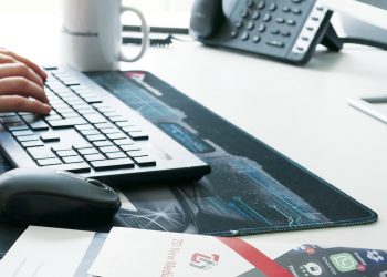 What software should you consider using to design a brochure?