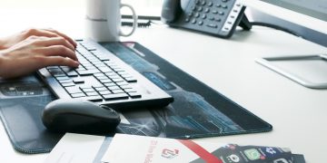 What software should you consider using to design a brochure?