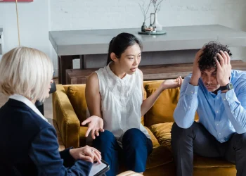 Couple talking with a marriage counsellor during a therapy session